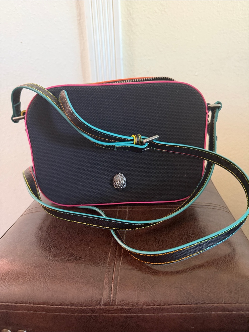 Kurt Geiger Black Crossbody with Teal & Pink Trim used one time .